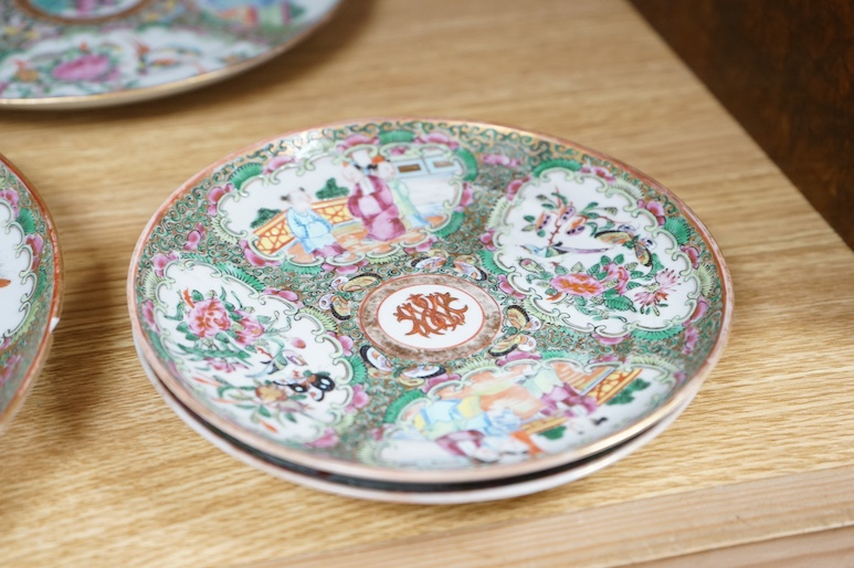 Five Chinese famille rose plates, Guangxu period and a pair of Chinese figures, 25cm in diameter. Condition - fair to good